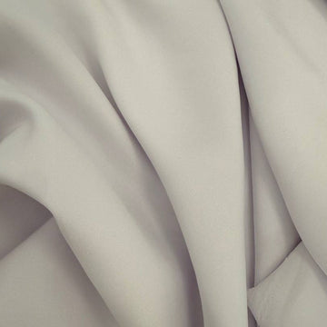 White dress crepe fabric with soft drape and matte finish 