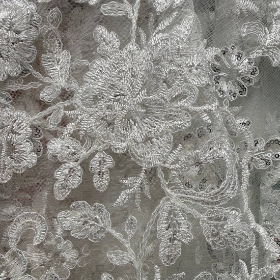 Ivory embroidered lace fabric with floral pattern and delicate sequins 