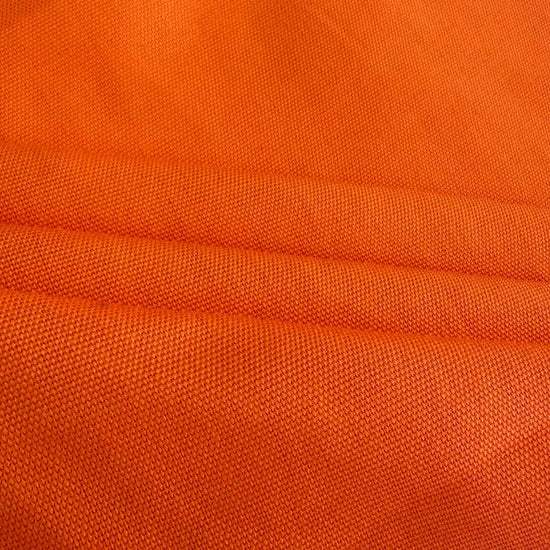 Orange cotton craft canvas fabric with smooth woven texture 