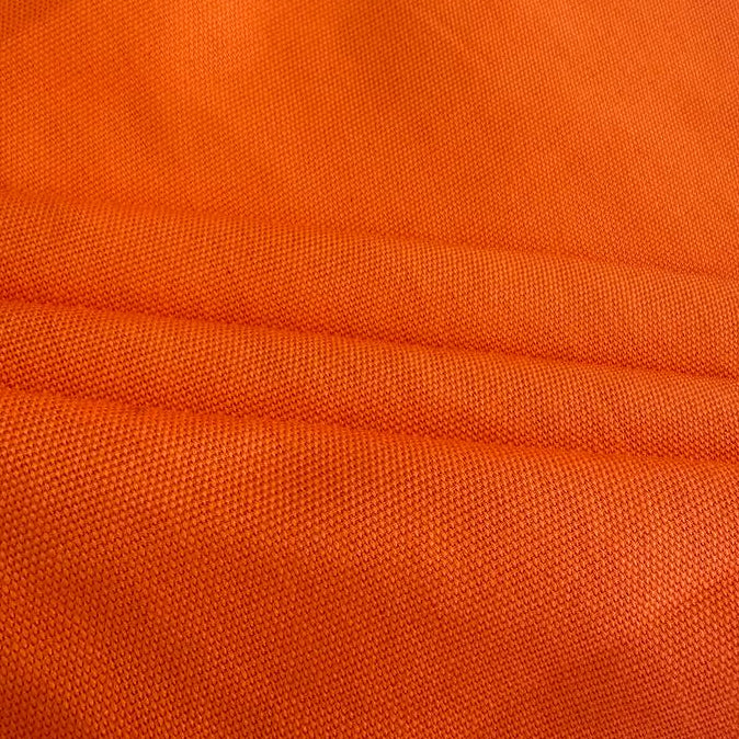 Orange cotton craft canvas fabric with smooth woven texture 