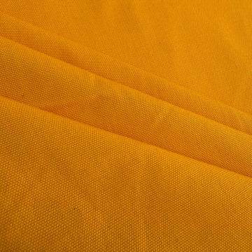 Yellow cotton craft canvas fabric with smooth woven texture 