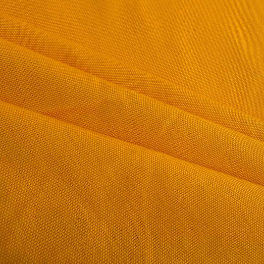 Yellow cotton craft canvas fabric with smooth woven texture 