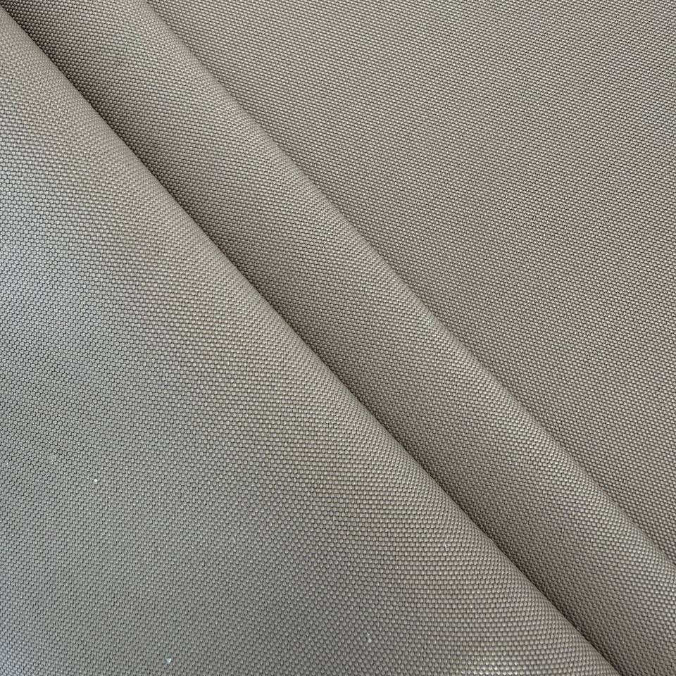 Sand polyester upholstery fabric suitable for indoor and covered outdoor use 