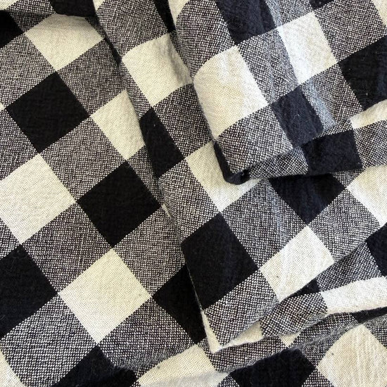 Organic checkered cotton fabric in black and white