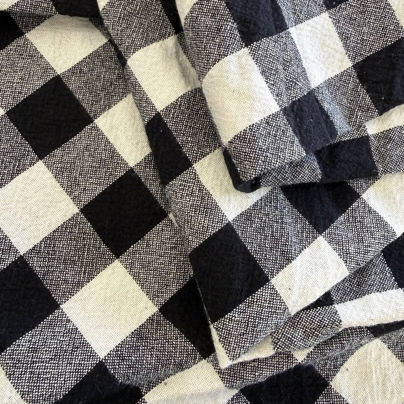 Organic checkered cotton fabric in black and white