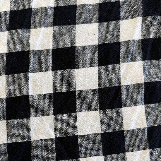 Organic checkered cotton fabric in black and white