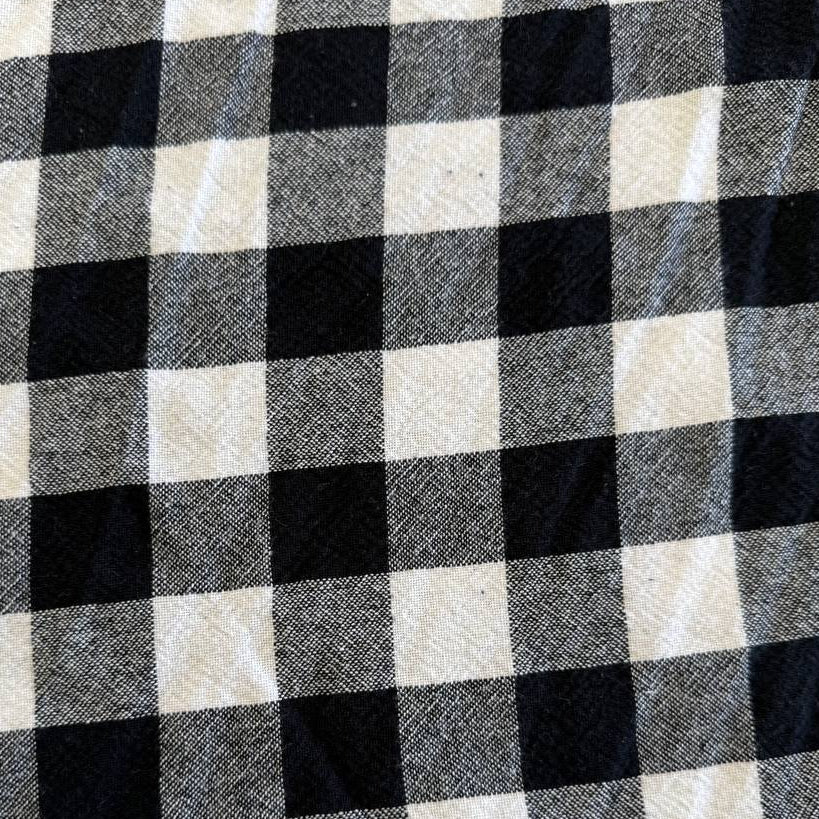 Organic checkered cotton fabric in black and white