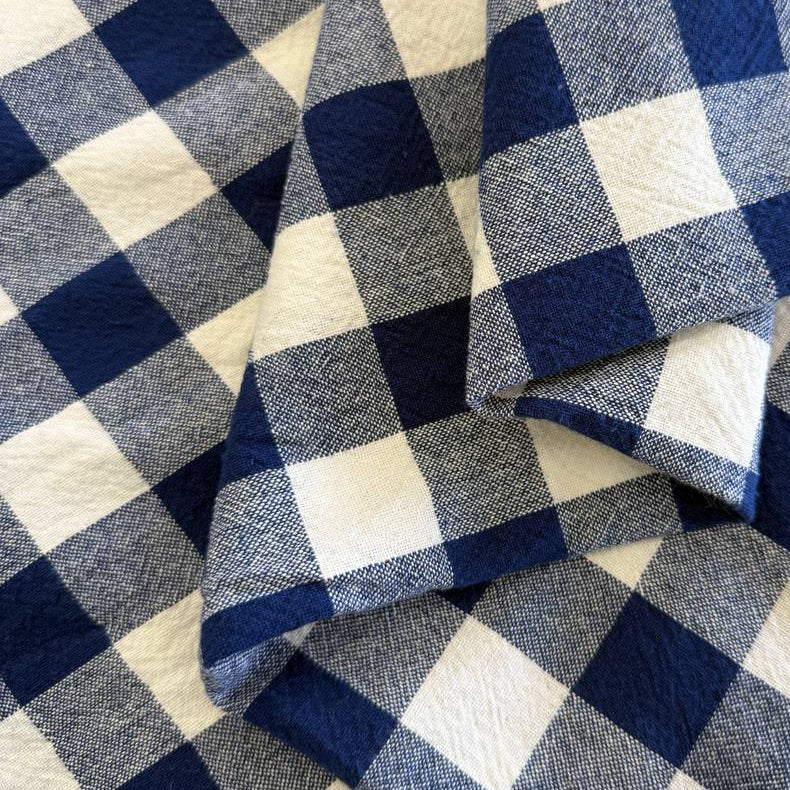 Organic checkered cotton fabric in navy blue and white