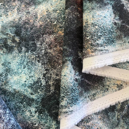 Hoffman Stag and Stone Breeze digitally printed quilting cotton fabric with dark blue and teal stone texture pattern.