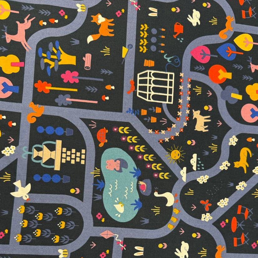 Woodland Park cotton fabric by Rashida Coleman-Hale for Ruby Star Society in dark and cream colorways featuring woodland animals and winding park paths.