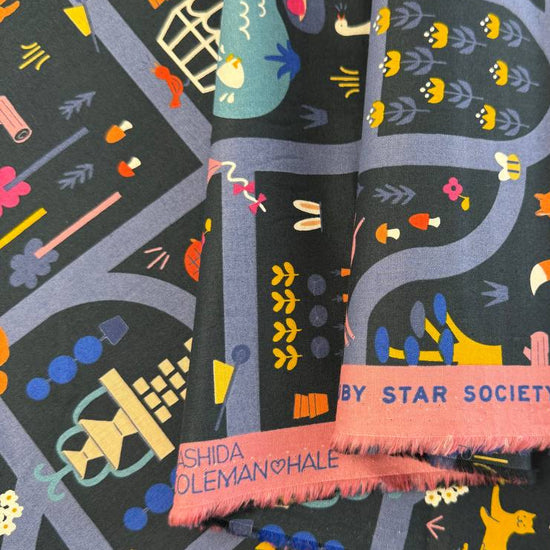 Woodland Park cotton fabric by Rashida Coleman-Hale for Ruby Star Society in dark and cream colorways featuring woodland animals and winding park paths.