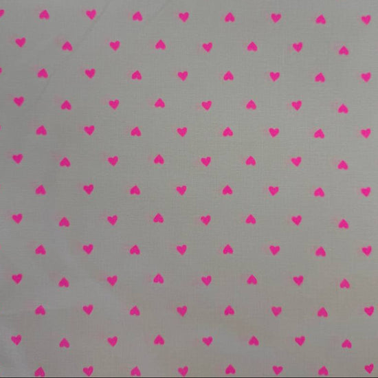 Trinketry hearts cotton fabric by Melody Miller for Ruby Star Society in multiple colors with tiny scattered heart print.