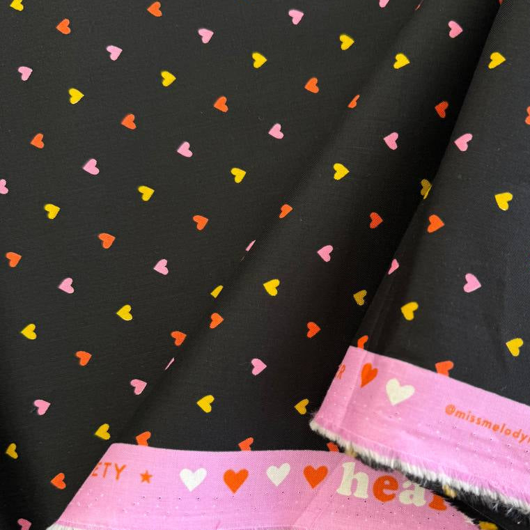 Trinketry hearts cotton fabric by Melody Miller for Ruby Star Society in multiple colors with tiny scattered heart print.