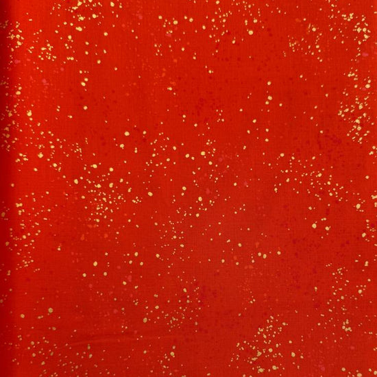 Ruby Star Society Speckled metallic cotton fabric available in navy, pink, and orange colors.