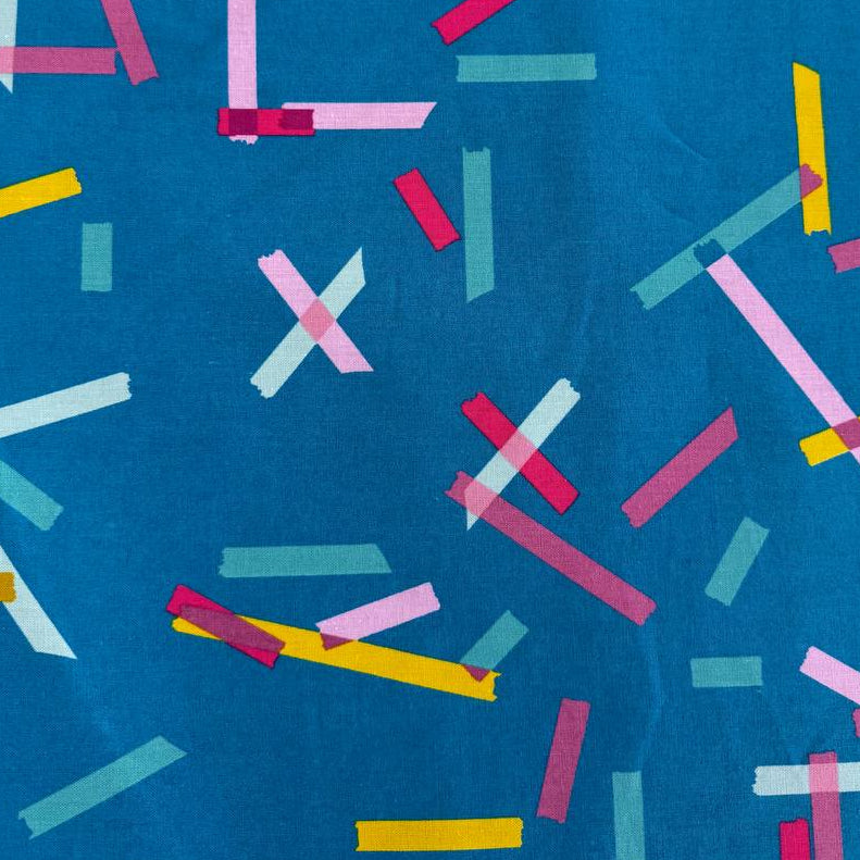 Blue linen cotton fabric with colorful abstract tape stripe print from Washi Plus by Rashida Coleman-Hale for Ruby Star Society.