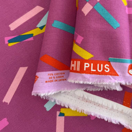 Blue linen cotton fabric with colorful abstract tape stripe print from Washi Plus by Rashida Coleman-Hale for Ruby Star Society.