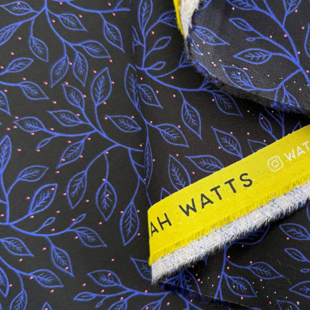 Glow Garden cotton fabric by Sarah Watts for Ruby Star Society with delicate vine leaf pattern in pink and blue colorways on dark backgrounds