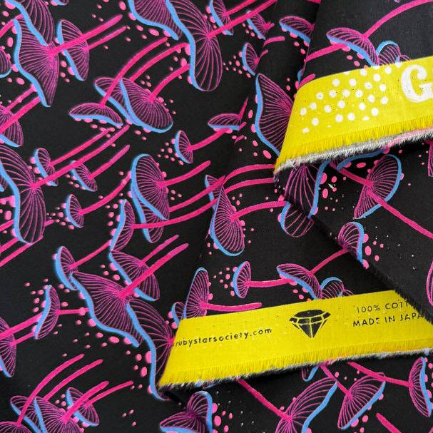 Glow Garden mushroom cotton fabric by Sarah Watts for Ruby Star Society available in black and light grey colorways.
