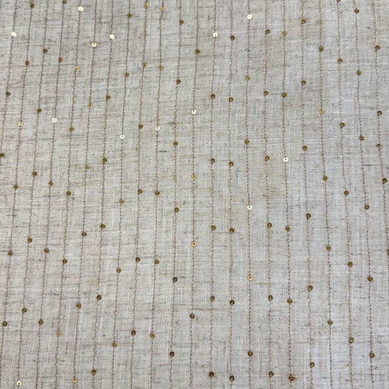 Natural linen blend fabric with vertical gold sequin lines