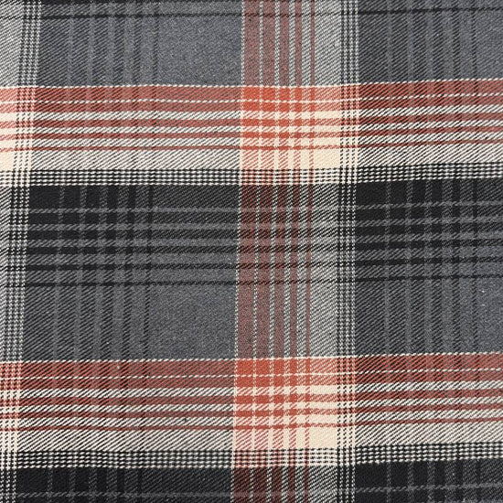Black, grey, cream and rust double-sided plaid fabric with a classic yarn-dyed tartan pattern.