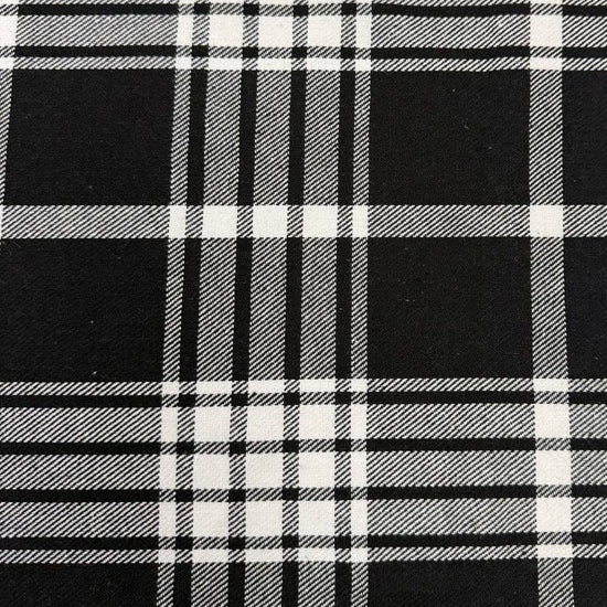 Black and white double-sided yarn-dyed plaid fabric with a classic tartan pattern.