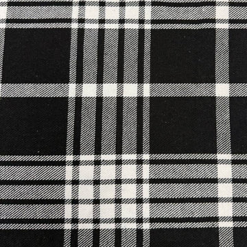 Black and white double-sided yarn-dyed plaid fabric with a classic tartan pattern.