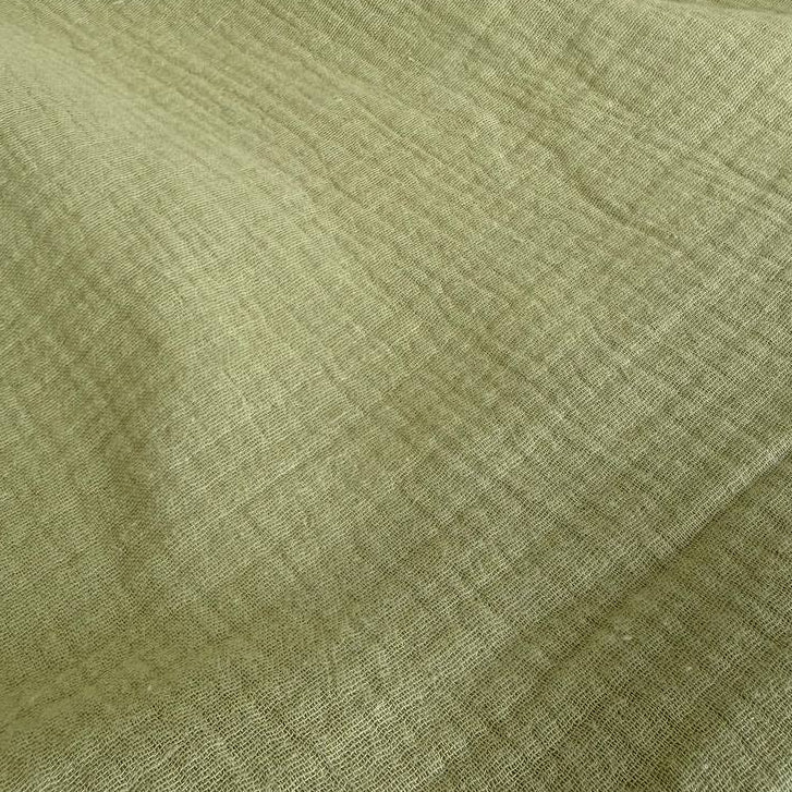 Elegant double gauze fabric in a soft sage green shade.