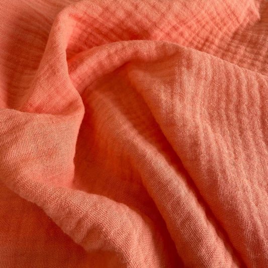 Beautiful double gauze fabric in a warm orange shade.