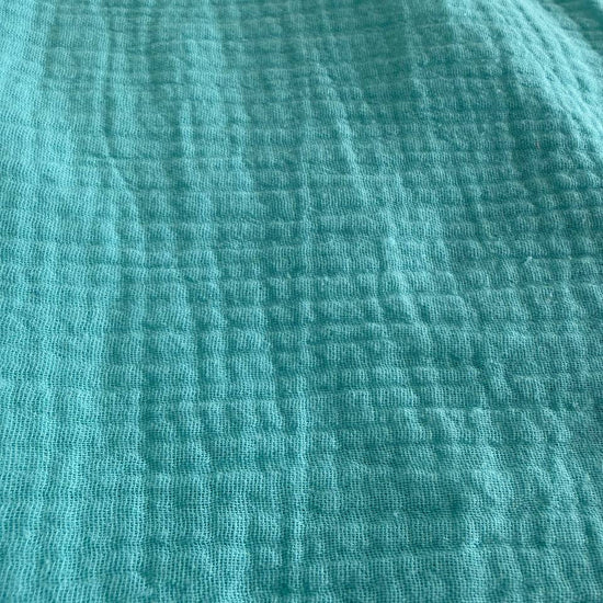 Soft and elegant double gauze fabric in a beautiful blue shade.