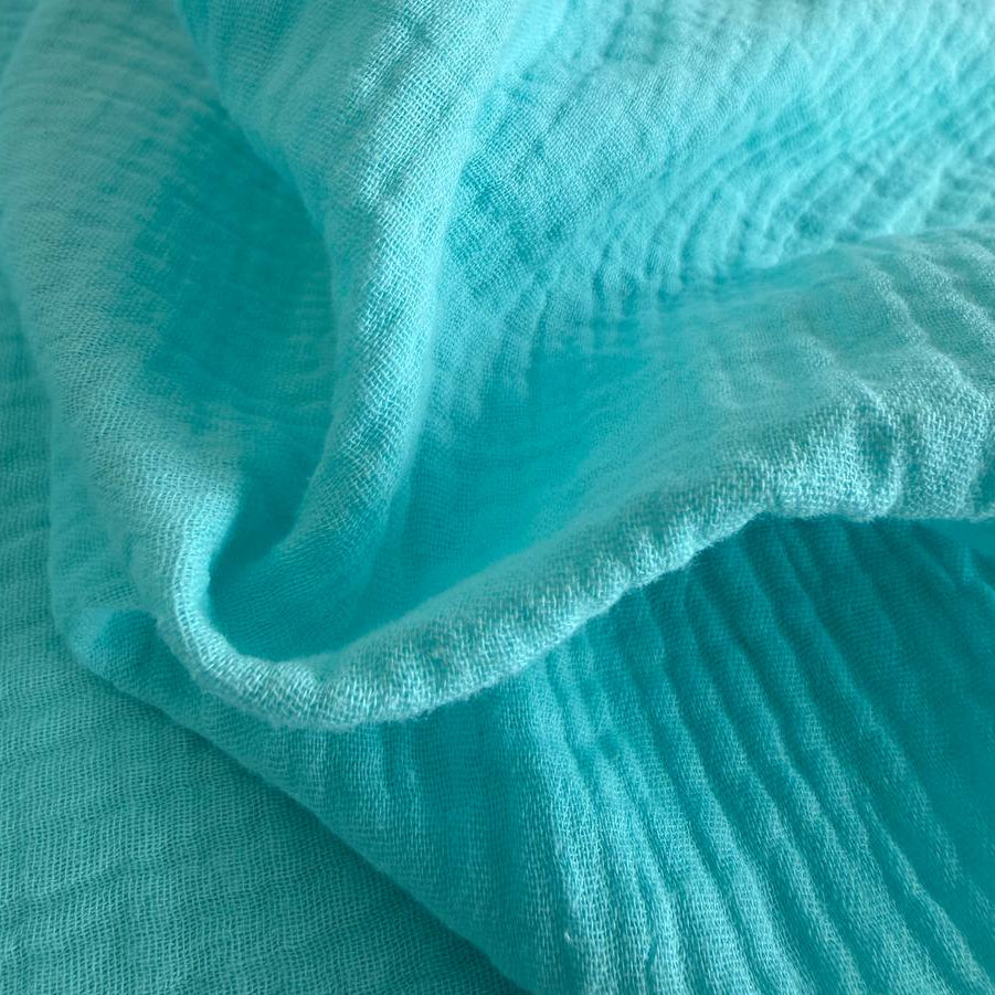 Soft and elegant double gauze fabric in a beautiful blue shade.