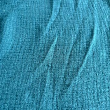Soft and breathable double gauze fabric in a rich teal shade.