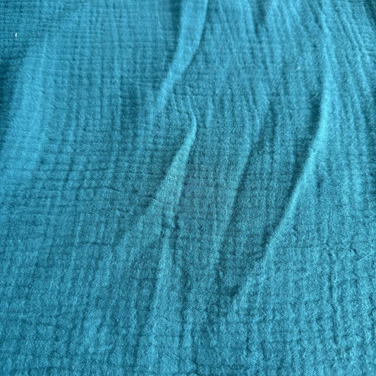 Soft and breathable double gauze fabric in a rich teal shade.