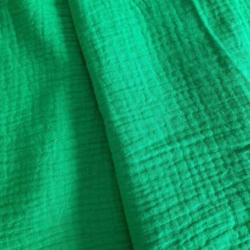 Soft and breathable double gauze fabric in a fresh green shade.