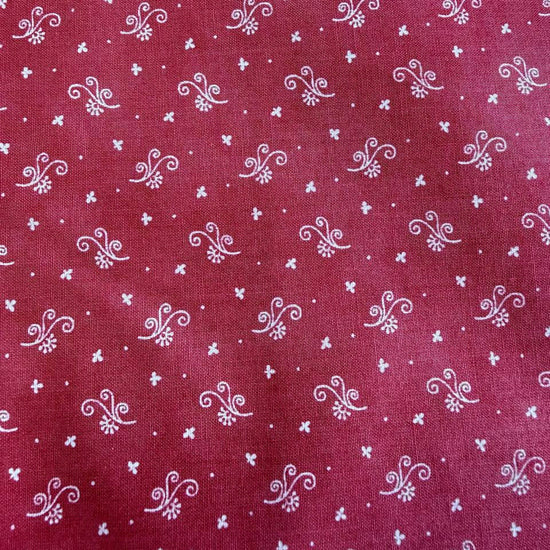 red quilting cotton fabric with small white decorative floral pattern – Sasha’s Atelier Canada