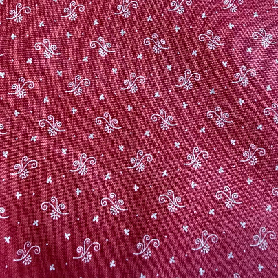 red quilting cotton fabric with small white decorative floral pattern – Sasha’s Atelier Canada