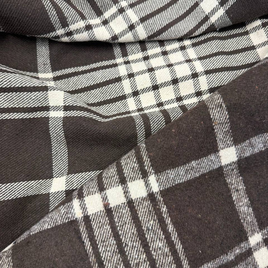 Black and white yarn-dyed plaid fabric, 85% cotton and 15% polyester, double-sided, 150 cm wide.