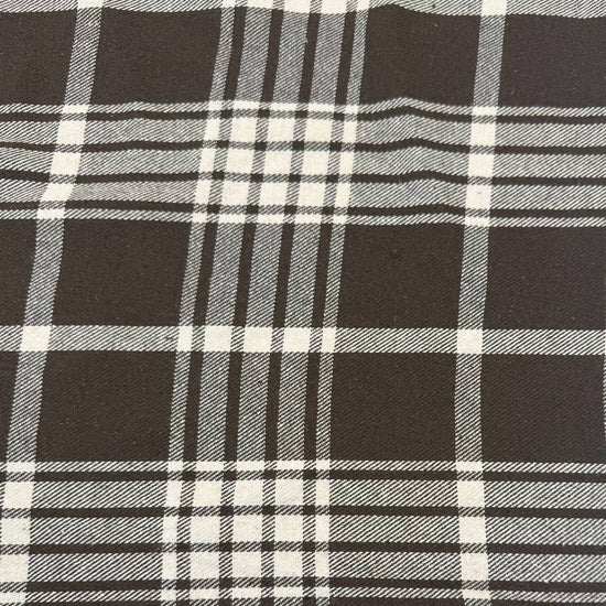 Black and white yarn-dyed plaid fabric, 85% cotton and 15% polyester, double-sided, 150 cm wide.