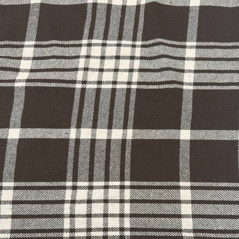 Black and white yarn-dyed plaid fabric, 85% cotton and 15% polyester, double-sided, 150 cm wide.