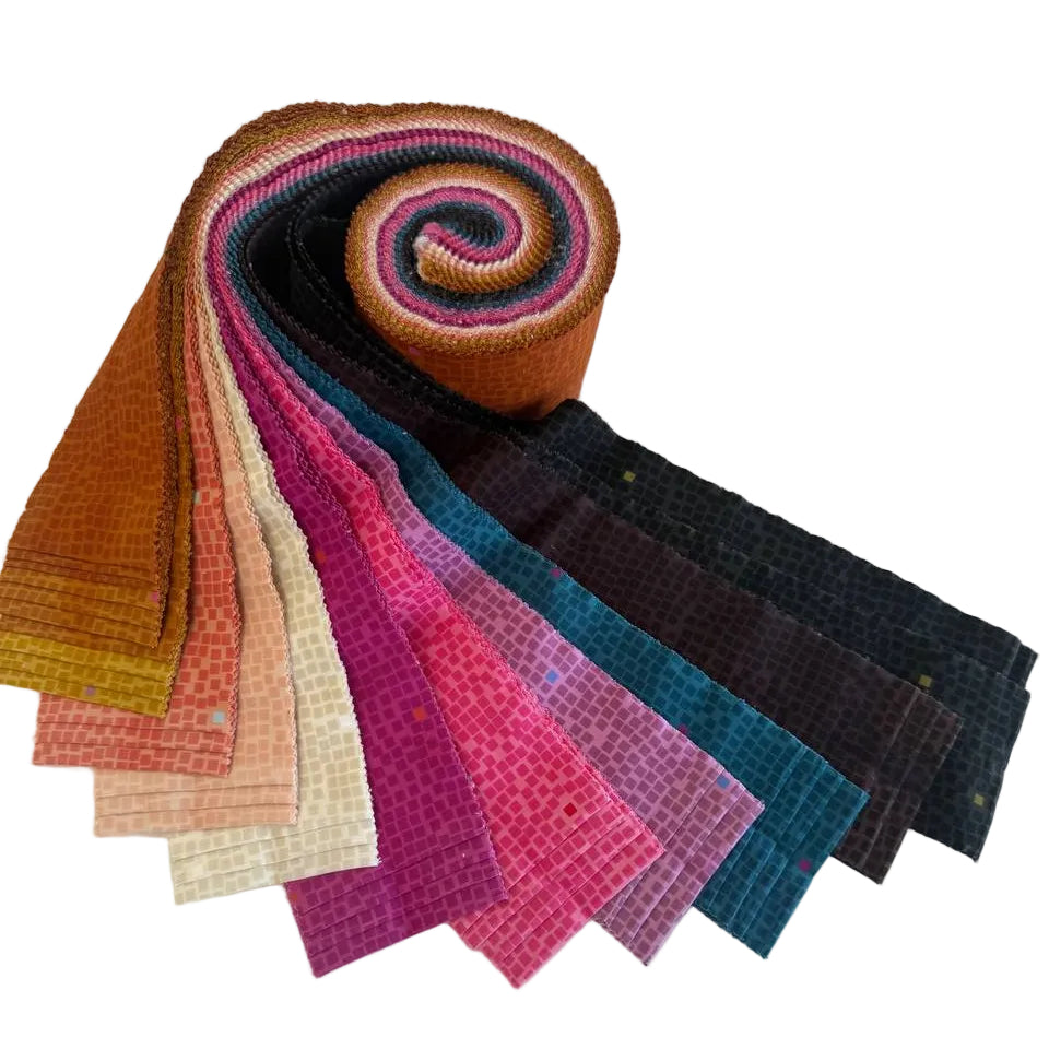 Pixel Jelly Roll by Rashida Coleman-Hale for Ruby Star Society featuring colorful quilting cotton strips in copper, pink, cream, lavender, teal, and charcoal shades with a modern pixel pattern.