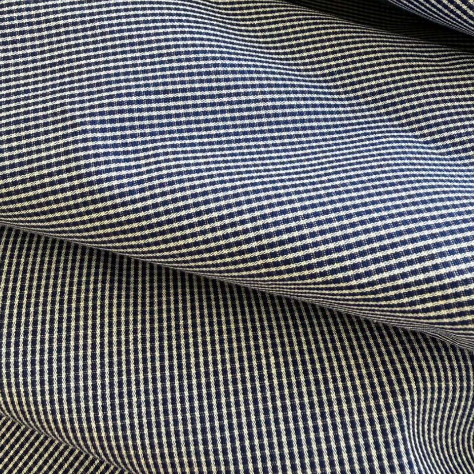 Classic striped shirting fabric in a timeless blue and white pattern.