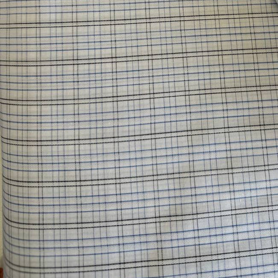 Lightweight shirting fabric in a refined blue micro check pattern.