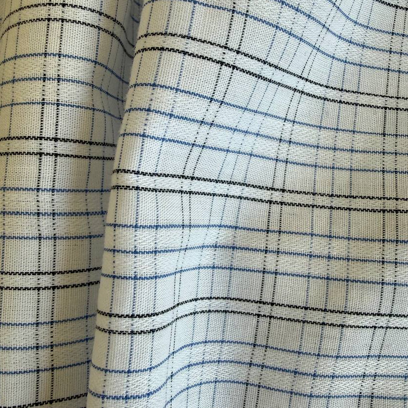 Lightweight shirting fabric in a refined blue micro check pattern.
