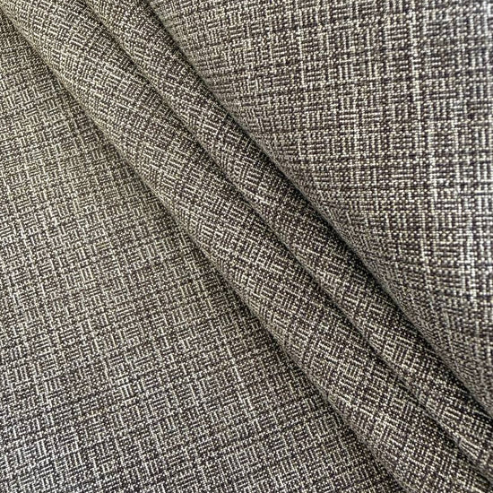 Structured suiting fabric in a refined grey textured weave.
