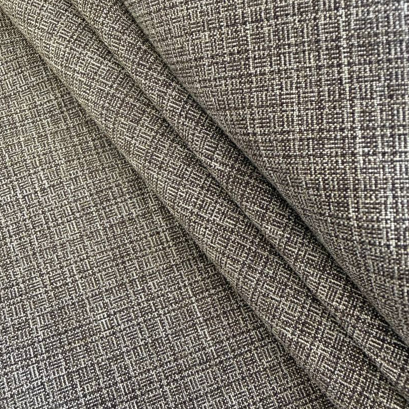 Structured suiting fabric in a refined grey textured weave.