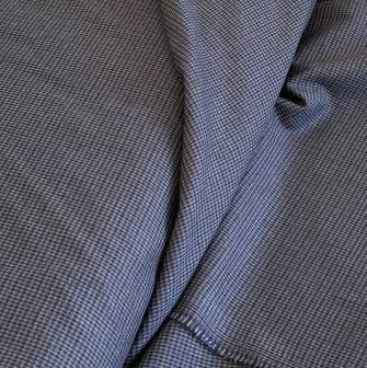 Refined suiting fabric in an elegant blue-grey micro check pattern.