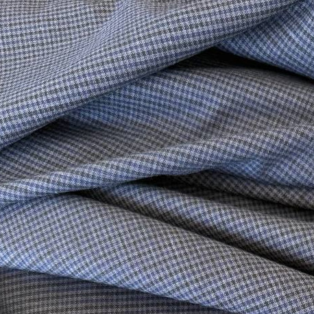 Refined suiting fabric in an elegant blue-grey micro check pattern.