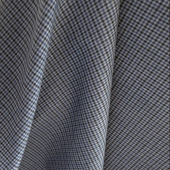 Refined suiting fabric in an elegant light blue-grey micro check pattern.