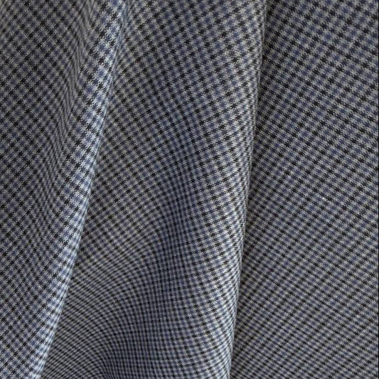 Refined suiting fabric in an elegant light blue-grey micro check pattern.