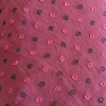 Elegant fancy cotton jacquard fabric in a rich burgundy shade.