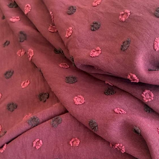 Elegant fancy cotton jacquard fabric in a rich burgundy shade.